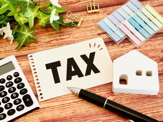 TAXと書かれたメモ